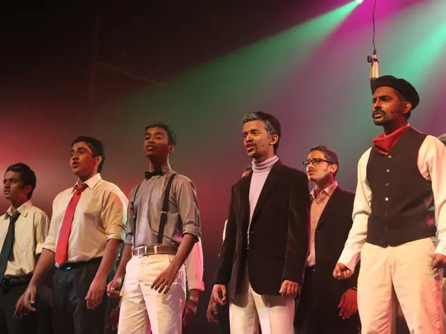 "Which individual will choose to take a rest on the sofa?"