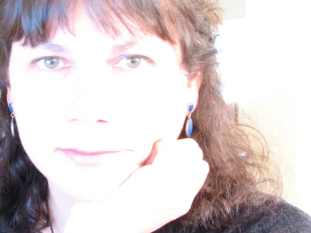 In this image we can see womans face.