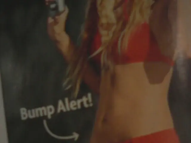 In the image I can see a woman is wearing bikini which is red in color. I can also see something...