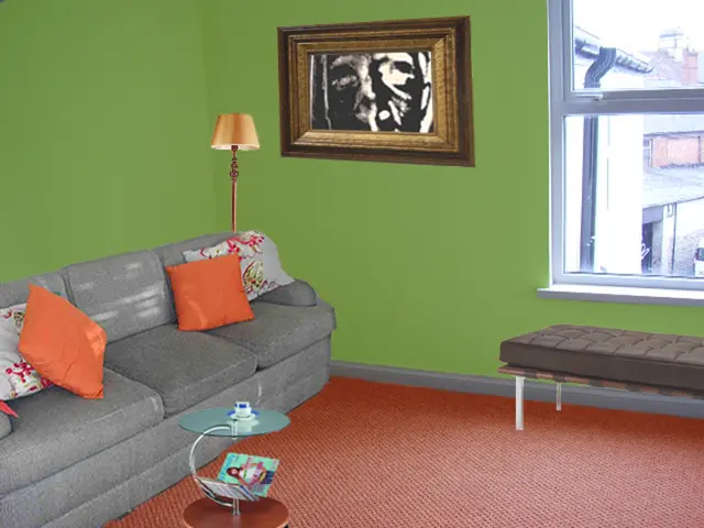 This picture shows the interior part of the room. In the image there are sofas on which there are...